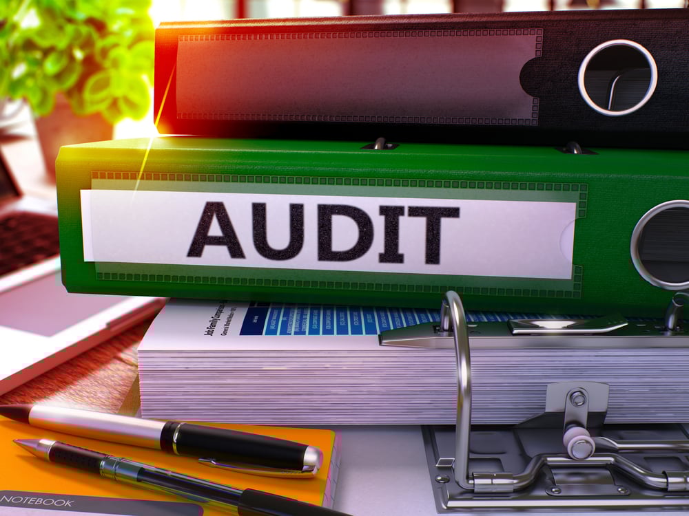 Green Office Folder with Inscription Audit on Office Desktop with Office Supplies and Modern Laptop. Audit Business Concept on Blurred Background. Audit - Toned Image. 3D Green Office Folder with Inscription Audit on Office Desktop with Office Supplies and Modern Laptop. Audit Business Concept on Blurred Background. Audit - Toned Image. 3D